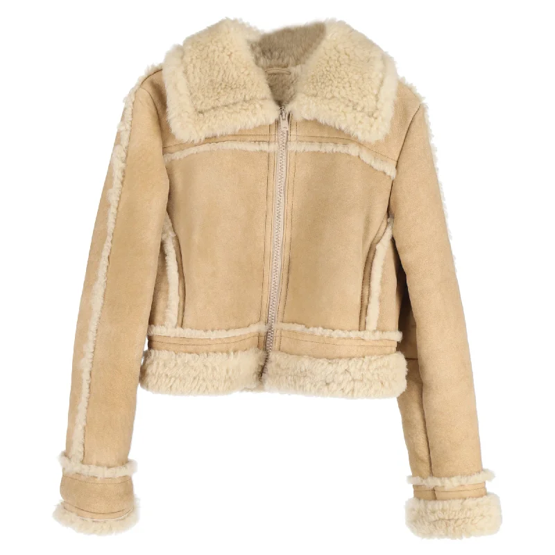 women's coats for maximalist fashion loversAcne Studios Lalita Lamb Shearling Jacket in Brown Suede